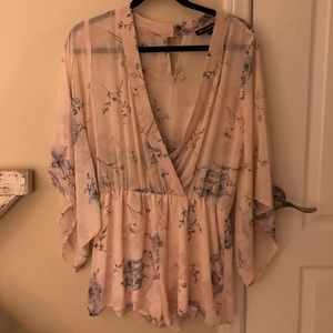 Three quarter light pink flower romper
